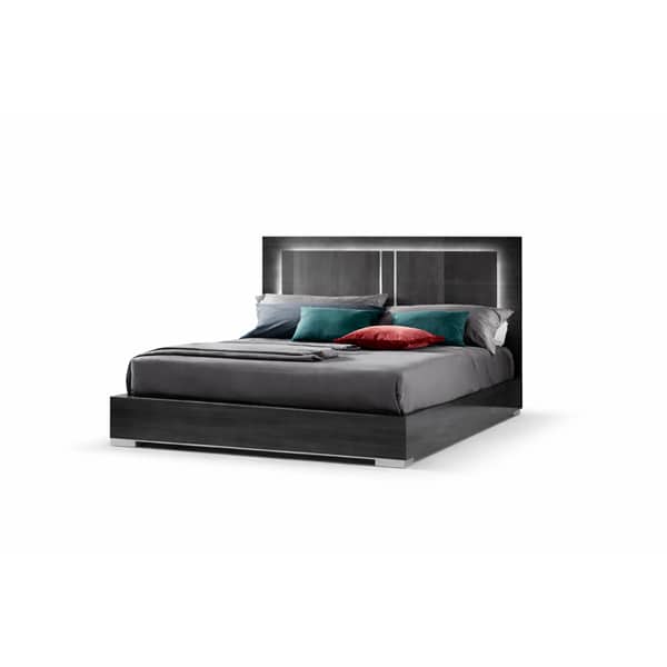 Toni Bed and Nightstand Set presented in a clean bedroom with wide room view